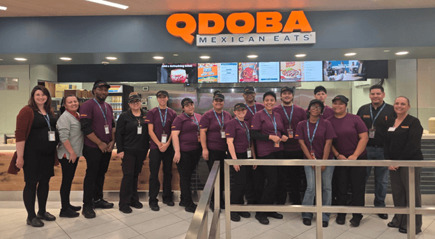 QDOBA team photo at Denver International Airport grand opening